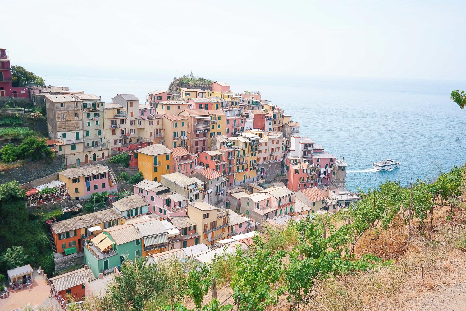 A rainbow assortment of houses in Cinque Terre as seen from the hiking trails