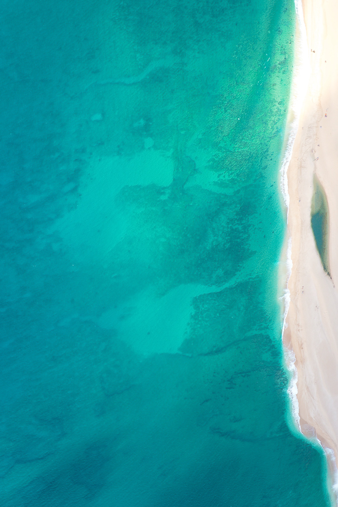 The bluest ocean aerial views from a helicopter