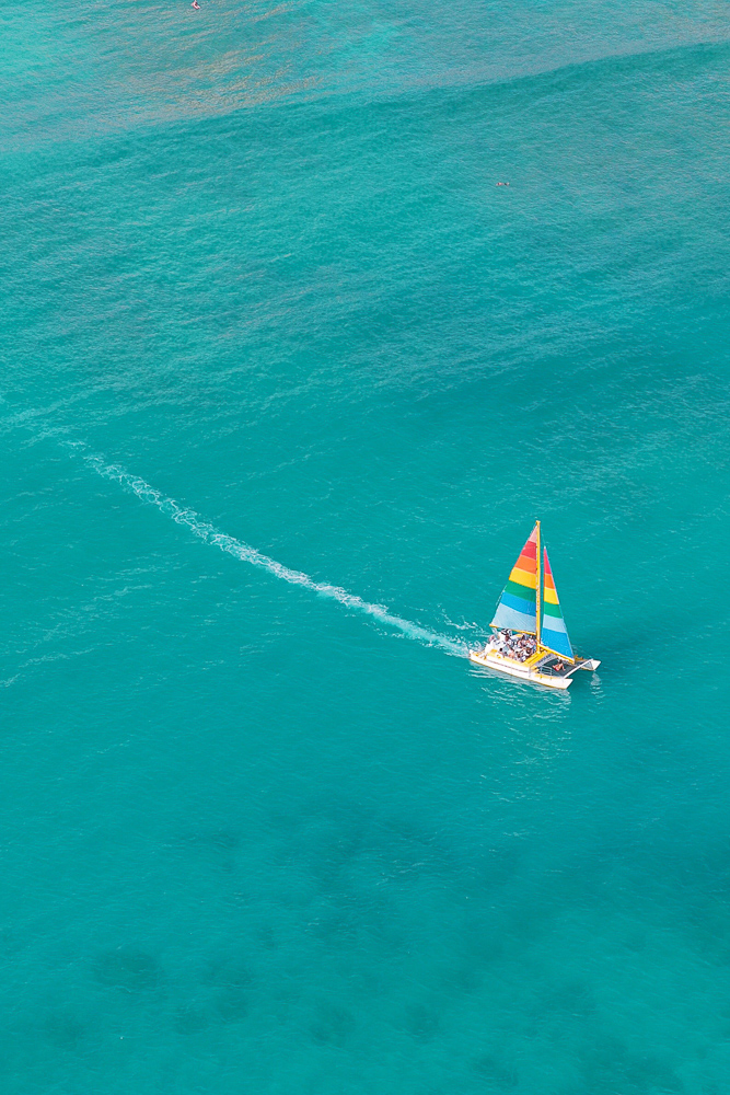 A lone sailboat seen from my helicopter tour