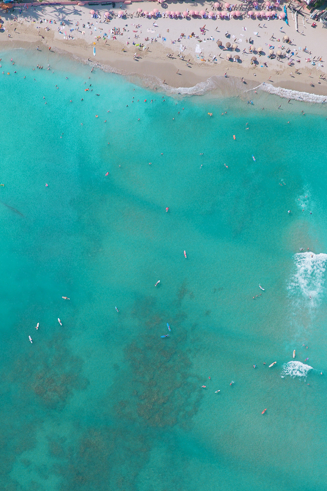 Aerial view of Waikiki beach and the Royal Hawaiian's pink umbrellas | Hawaii helicopter tour