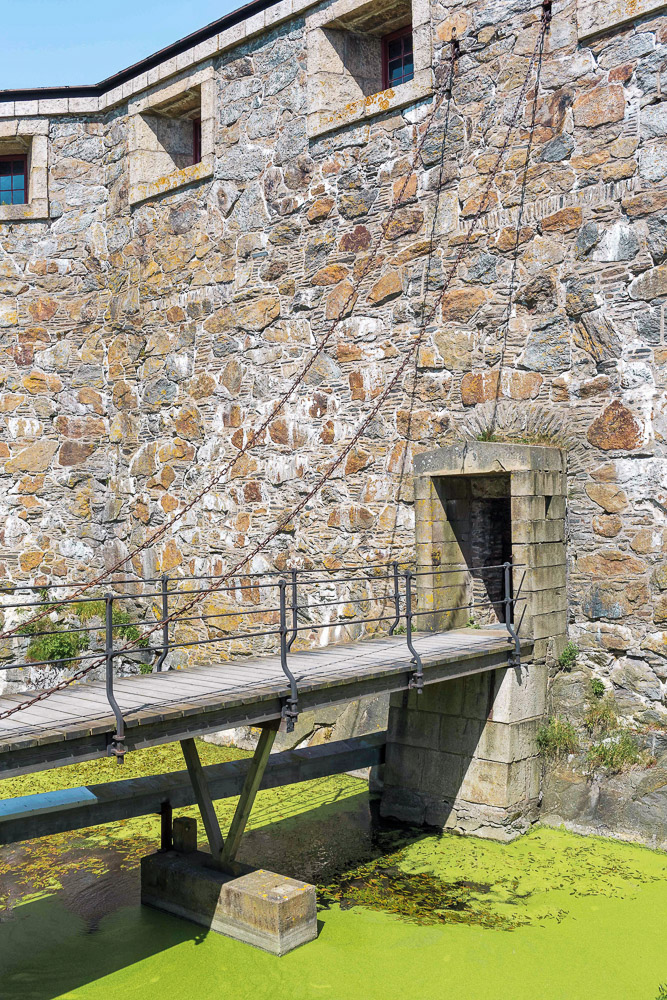 A draw bridge and moat inside of Carlsten Fortress