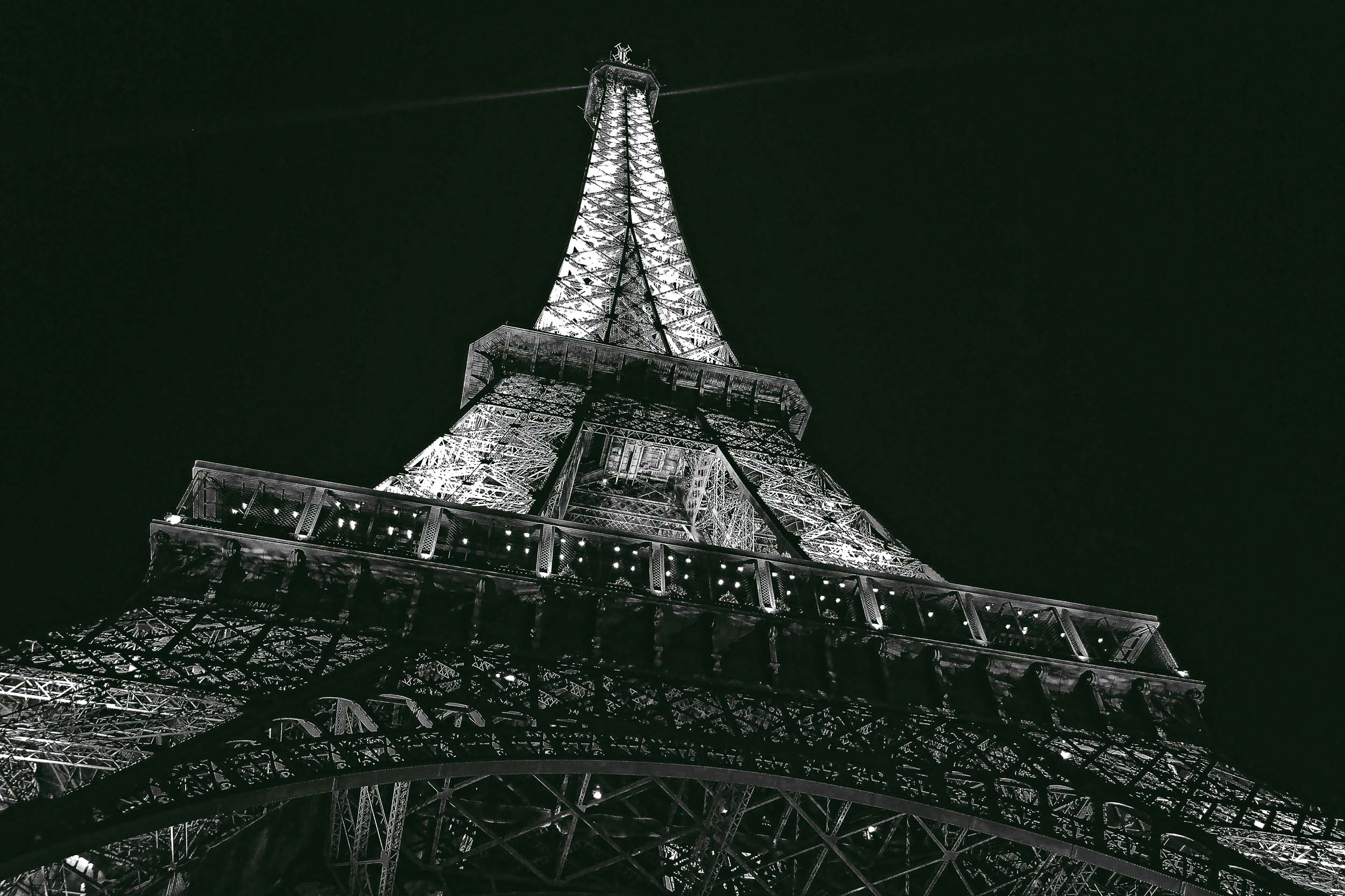The Eiffel Tower lit up at night time