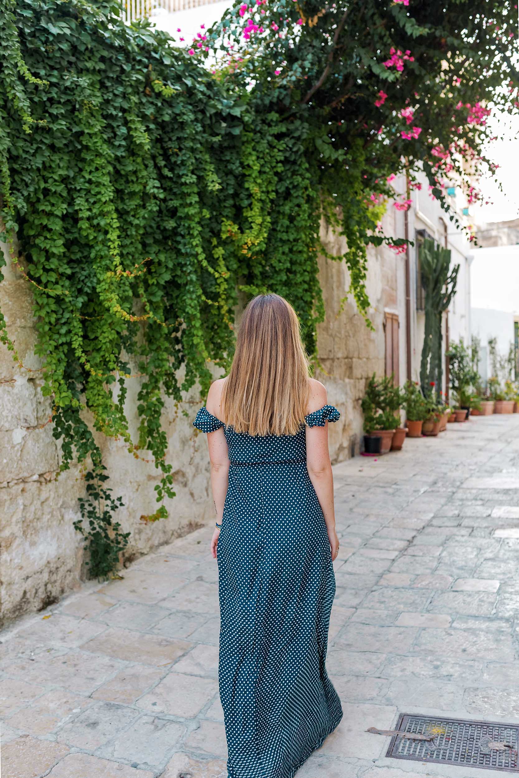 Walking to Grotta Palazzese Restaurant in Polignano A Mare, Italy