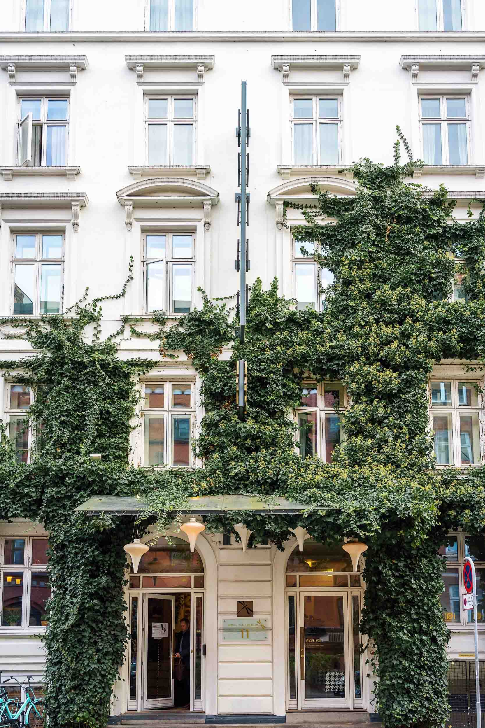 Where to stay in Copenhagen: The ivy-covered exterior at Axel Guldsmeden in Copenhagen