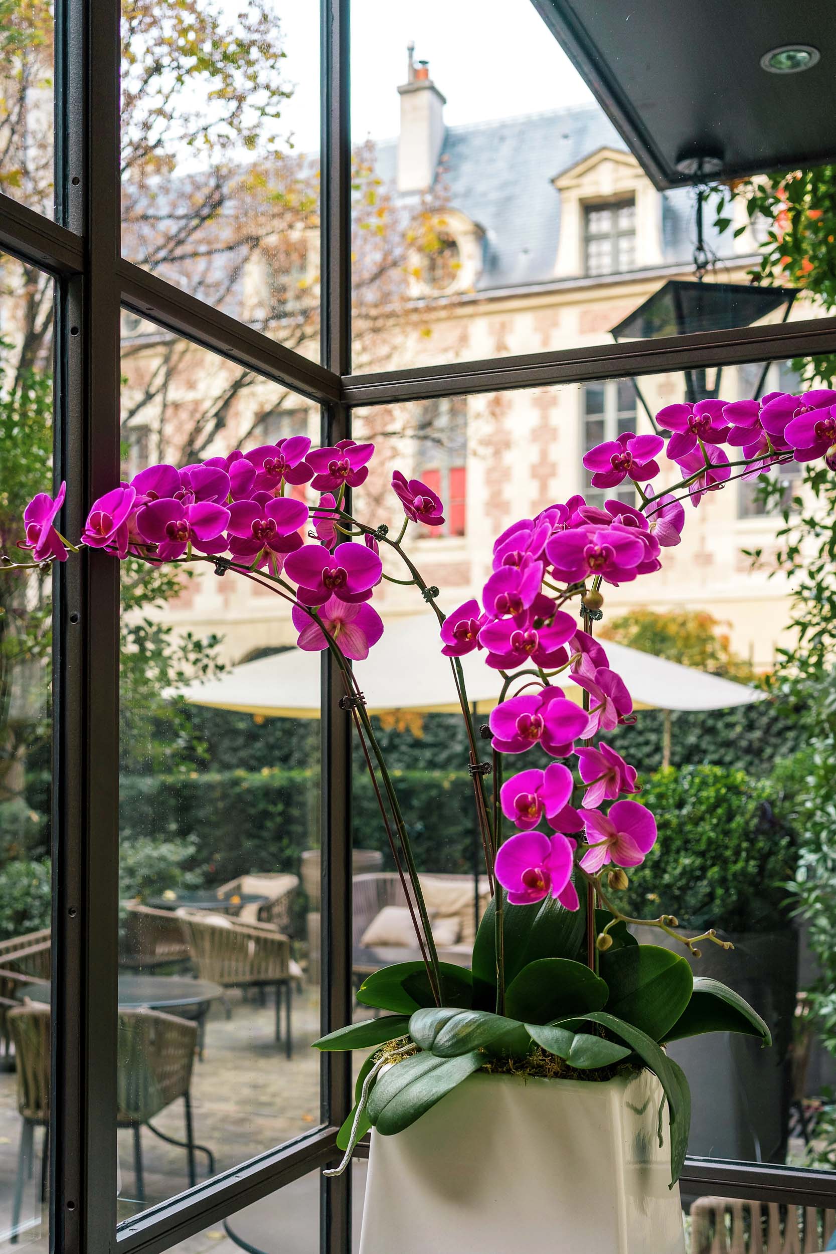 Breakfast views of the outdoor terrace at Pavillon de la Reine, five star hotel in Paris