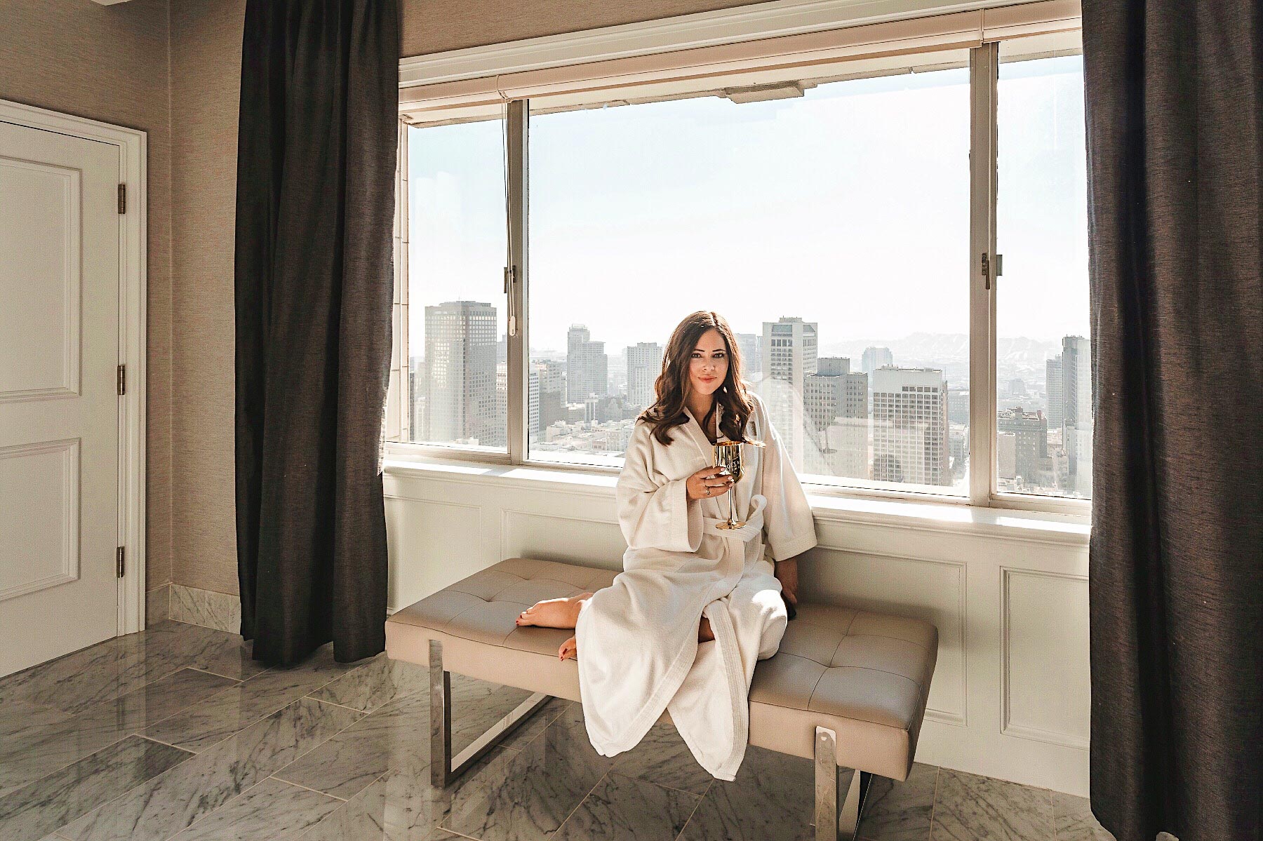 Enjoying some Moët & Chandon in the spa bathroom of the Fairmont Presidential Suite