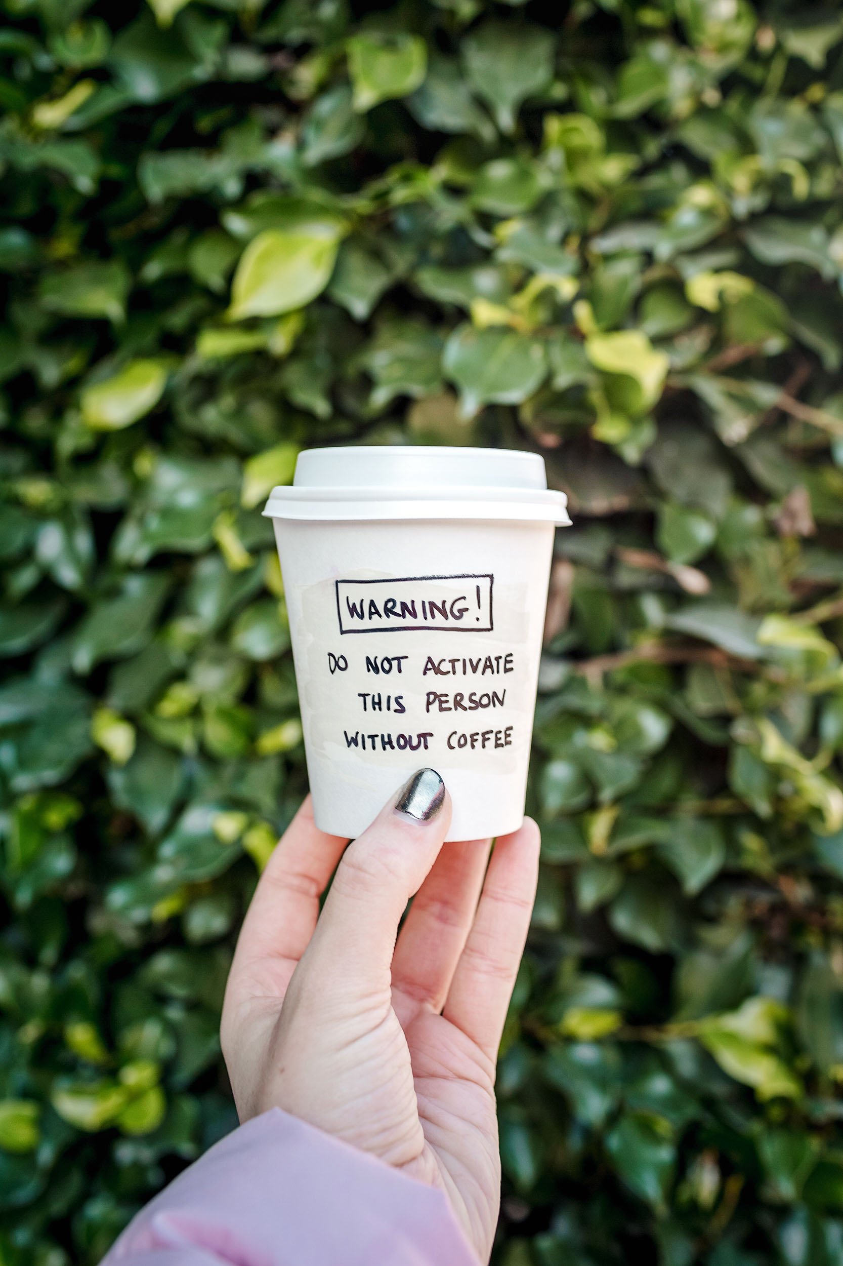 The to-go cups at Wish Slow Coffee House in Lisbon are so cheeky and fun!