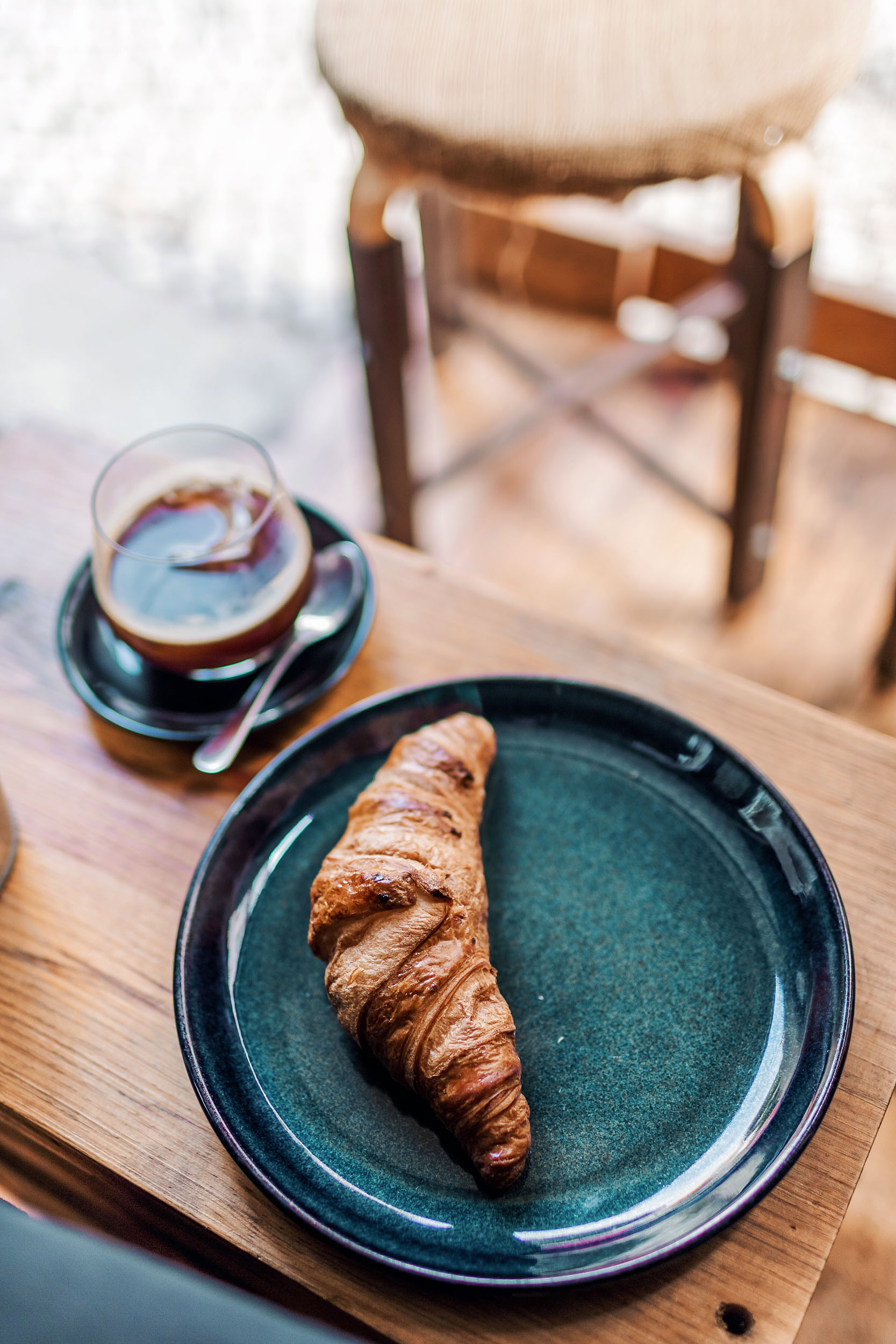 Fabrica Coffee Roasters in Lisbon offers coffee, beer, and light bites like sandwiches and pastries 