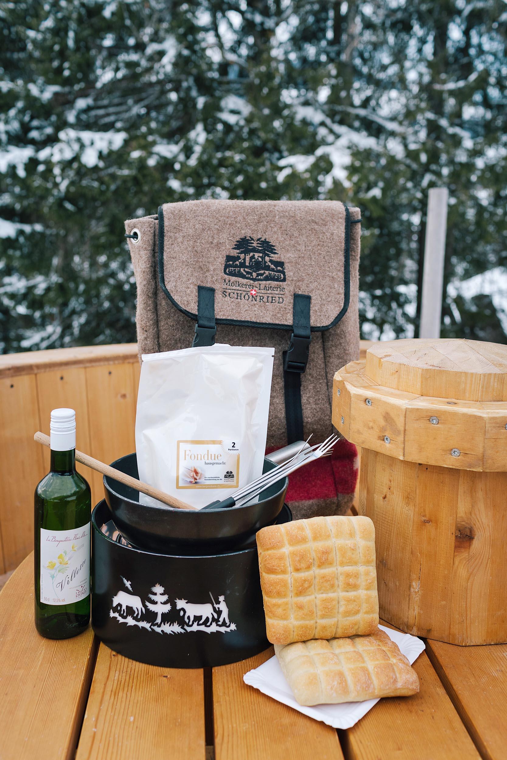 Before you start your fondue hike in Gstaad, you'll want to pick up a fondue backpack