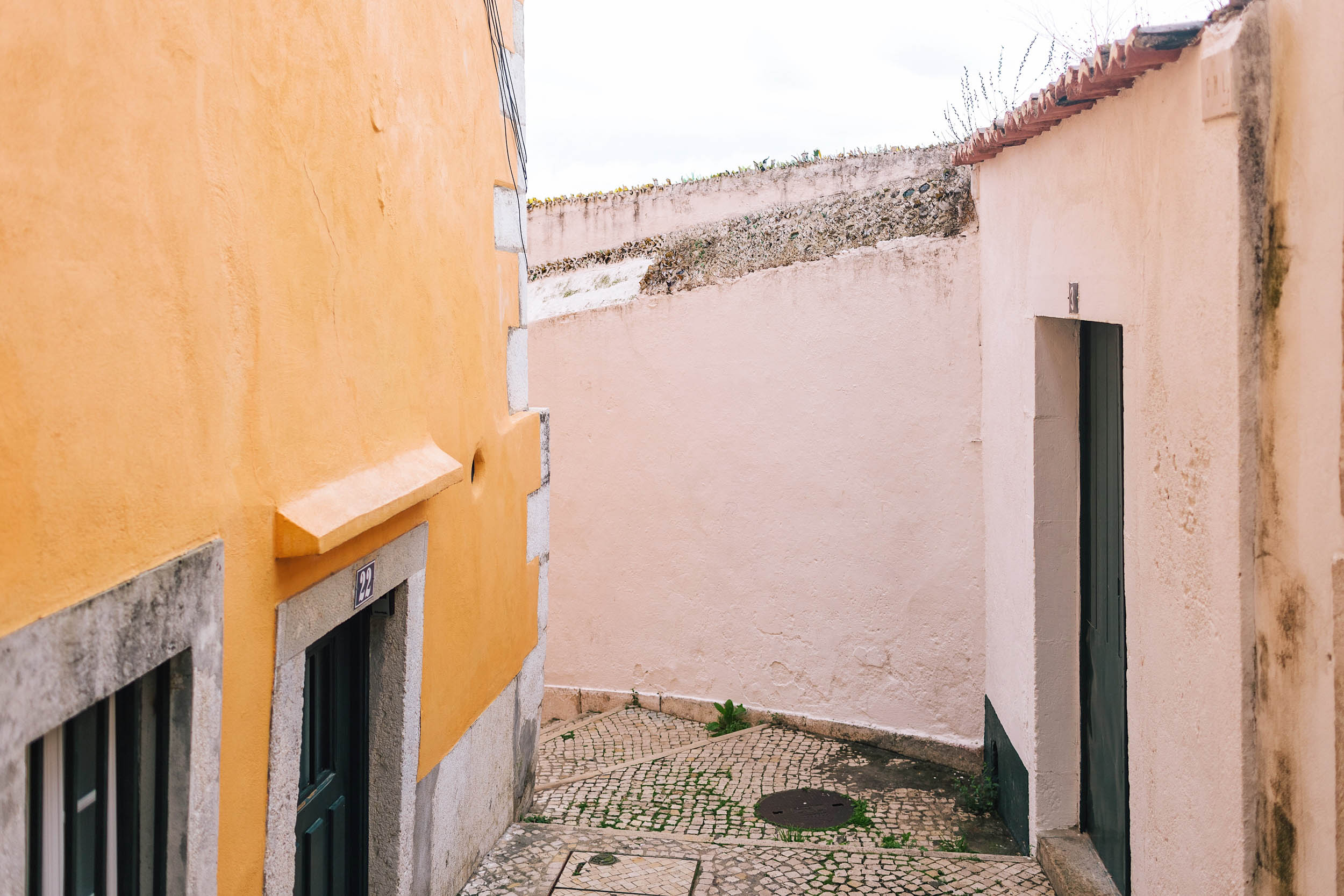 Make sure to spend time roaming Alfama when visiting Lisbon