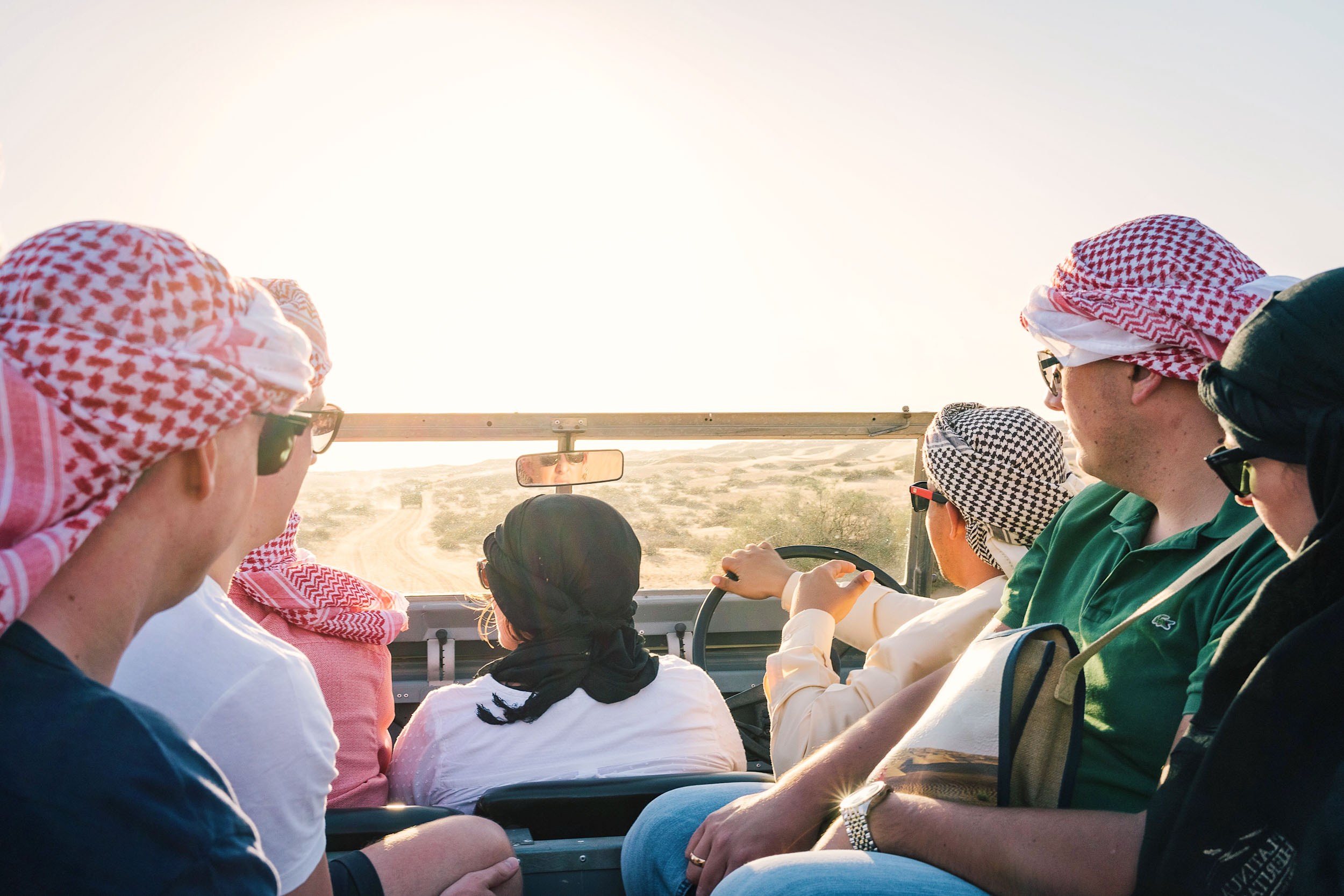 Driving vintage 1950's Land Rovers through the desert in Dubai