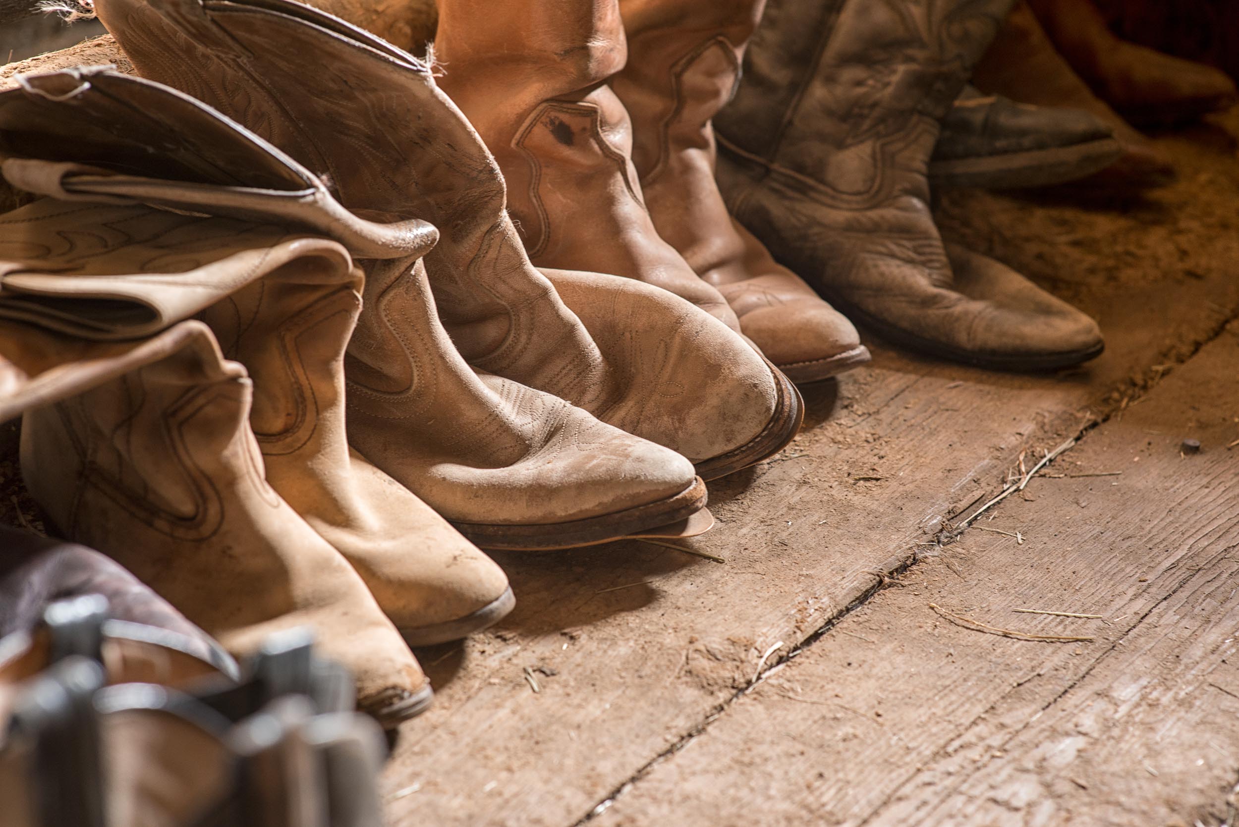 Cowboy boots at Watch Lake Lodge. Credit: Destination BC/Michael Bednar