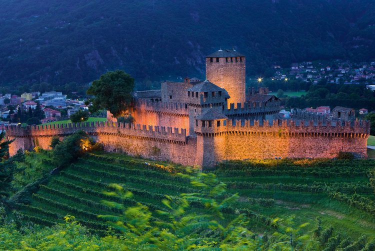 Bellinzona by night, Canton Ticino. The Montebello castle is part of the extensive fortifications originating from the 12th to the 15th centuries.