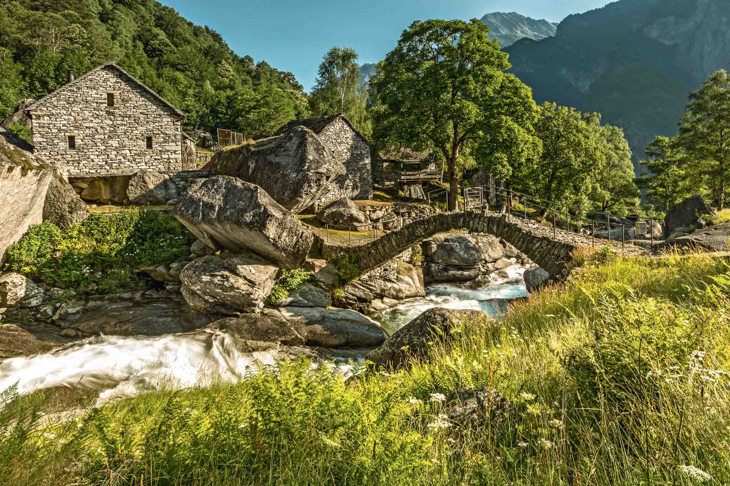 Historic bridge in Puntid, Bavona valley, Cevio.  Copyright by: Switzerland Tourism