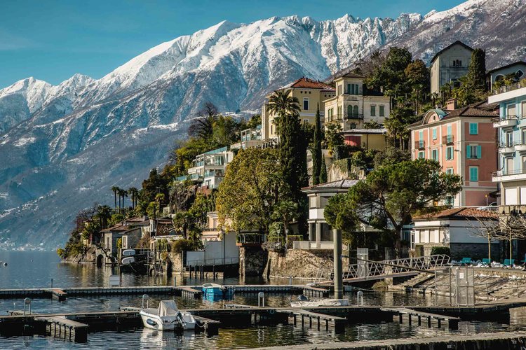 View from the port with the wintry Gridone in the background, Ascona. Copyright by: Switzerland Tourism