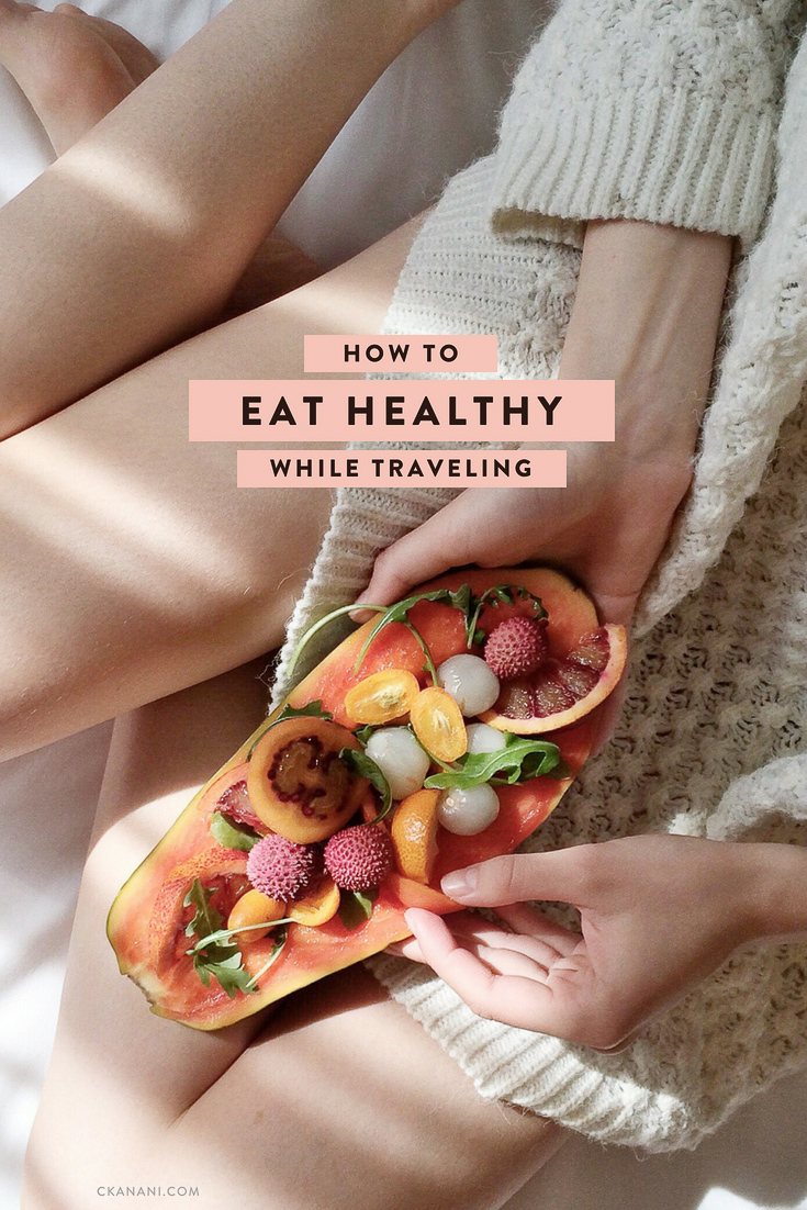 How to eat healthy while traveling to feel happy and full of energy! Tips like what to pack, what to order at restaurants, and more. #health #wellness #travel #healthyeating
