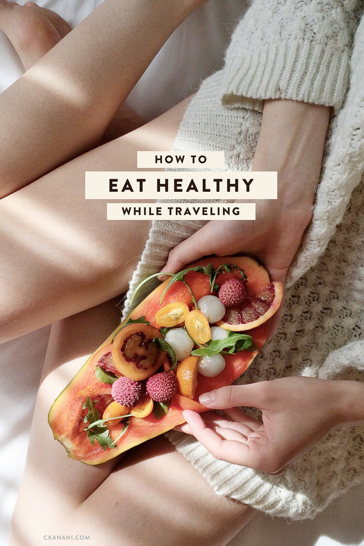 How to eat healthy while traveling to feel happy and full of energy! Tips like what to pack, what to order at restaurants, and more. #health #wellness #travel #healthyeating #fitness