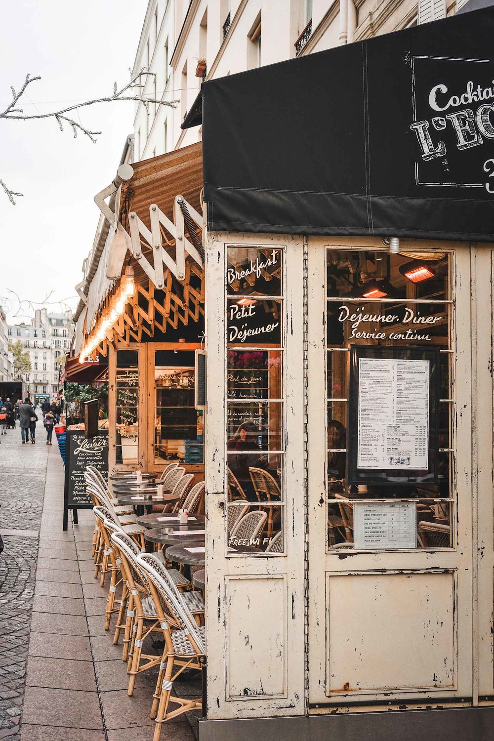 Things you can't miss on your Paris itinerary: stroll through Rue Cler and stop at L'Eclair for cocktails