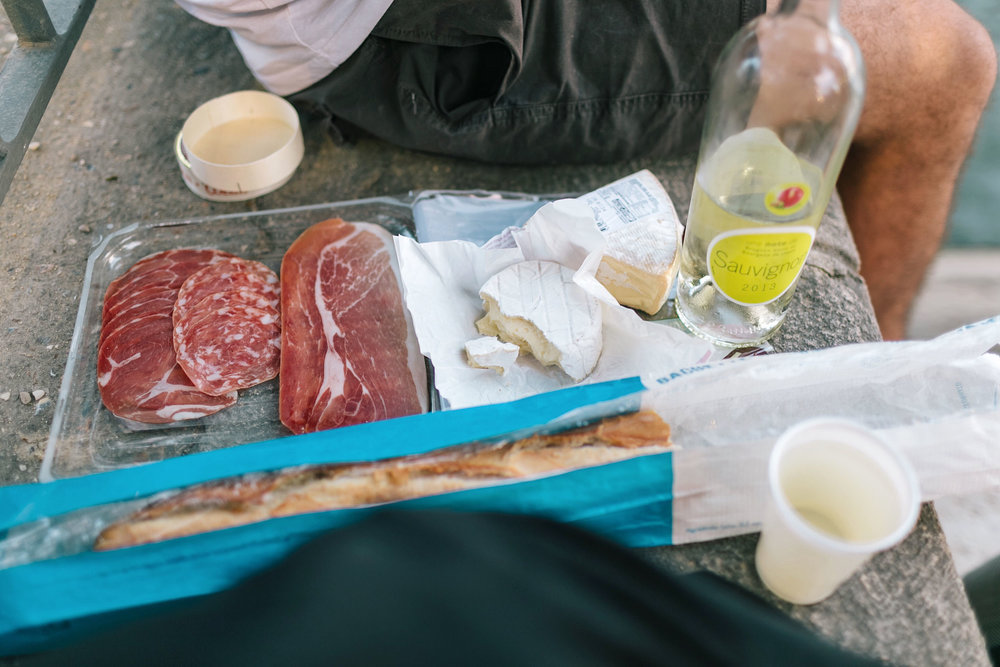 All the goods for a perfect Seine river sunset picnic, a must on any Paris itinerary