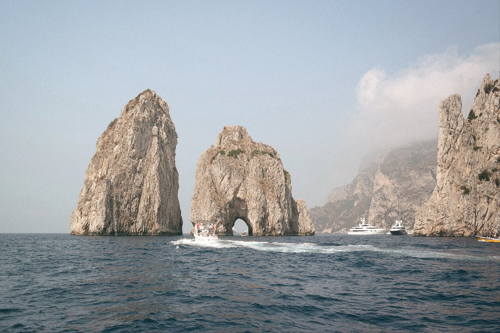 While in Positano, take a boat ride to La Fontelina, Capri