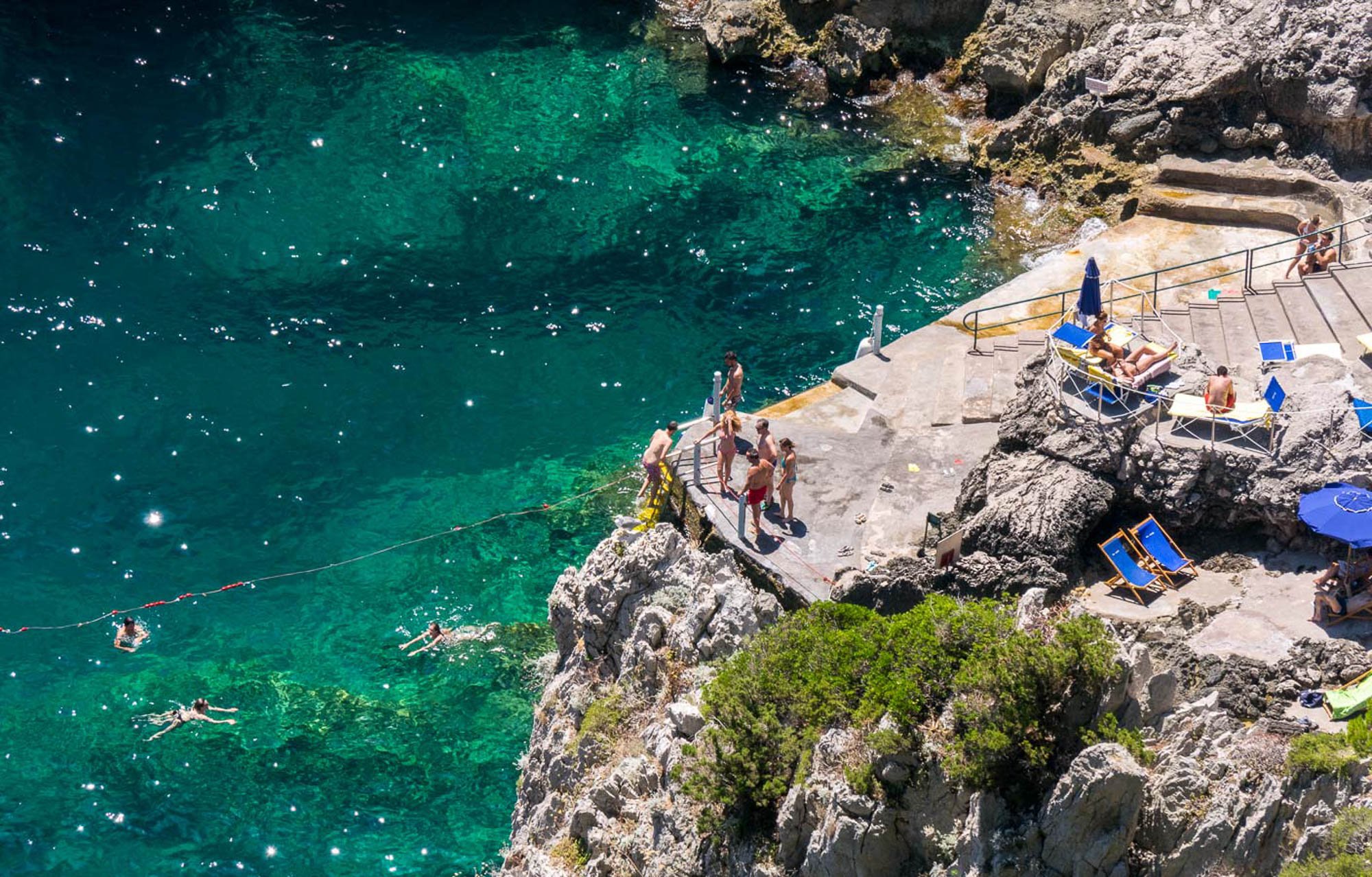 Another beach club Capri option across from the Faraglioni is Da Luigi ai Faraglioni.