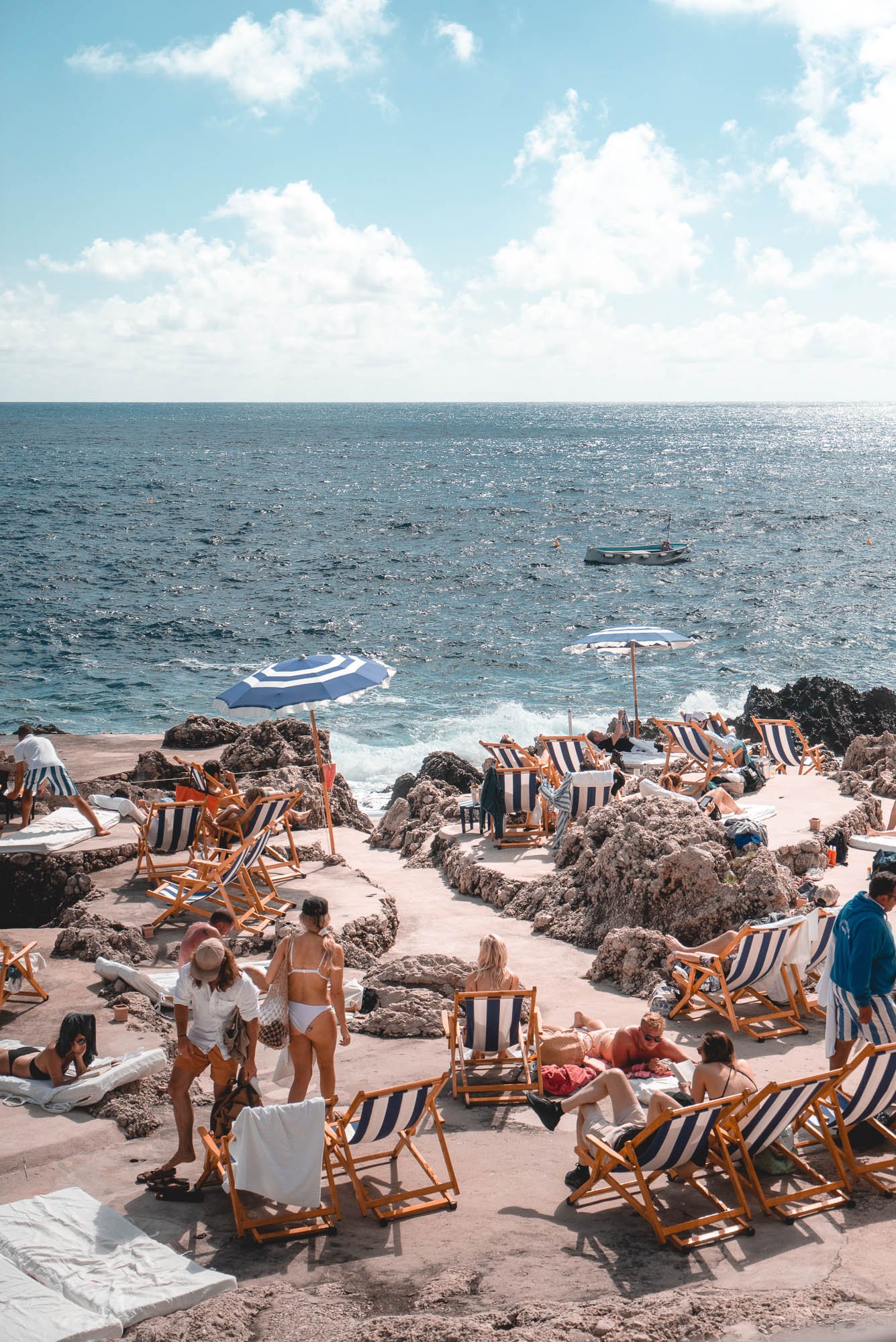 A day trip to Capri from Positano should include a visit to the iconic La Fontelina Beach Club Capri
