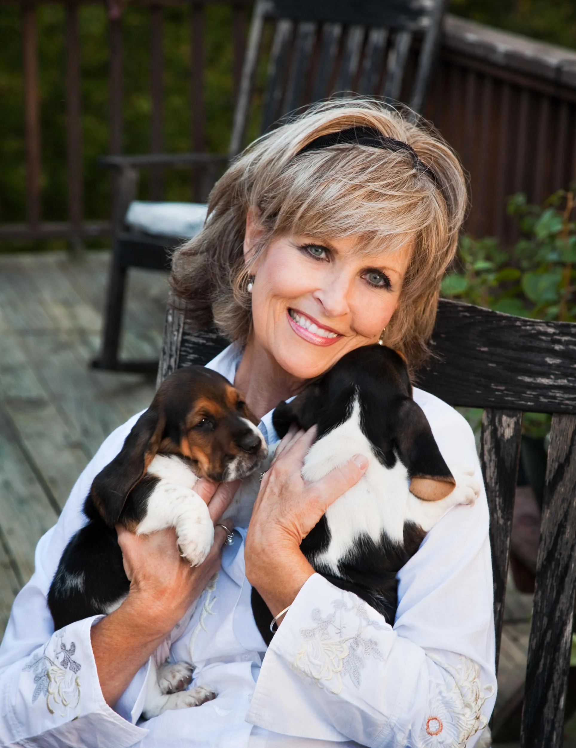 Editorial and Environmental Portraiture Raleigh NC: Magazine cover photo of a woman with Basset Hound puppies by Gottschall Photo.