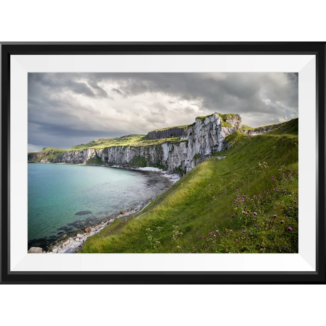 I wanted to share this photo today on Father&rsquo;s Day because it reminds me of my dad the most. It was taken during one of our trips to Northern Ireland together. While walking along the path at the Carrick-a-Rede rope bridge, he decided to jump d