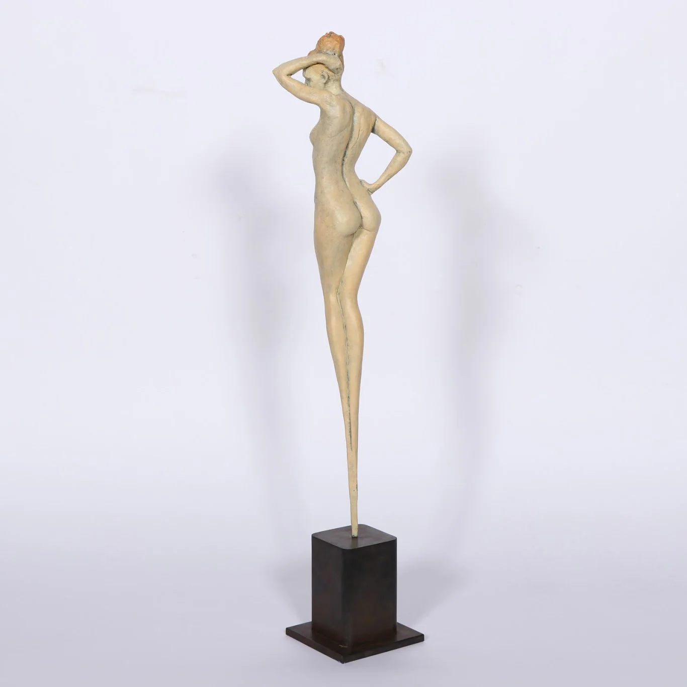   Miranda   30” H bronze sculpture with ochre patina  Steel black Base 6” x 4” square 
