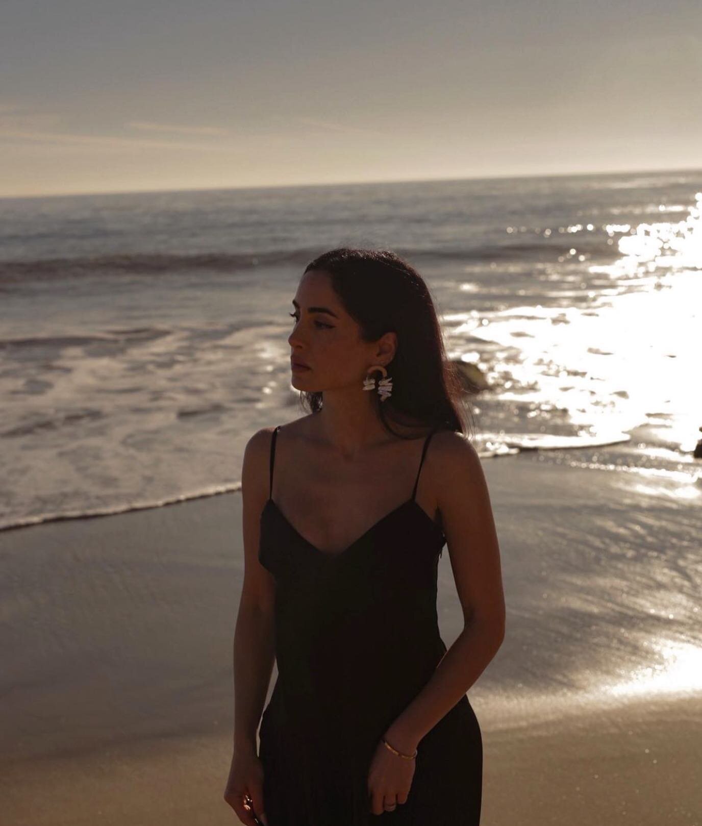 Summer bliss ☀️✨🕊 @sarah_najafi in the Arroyo Arc Earrings.