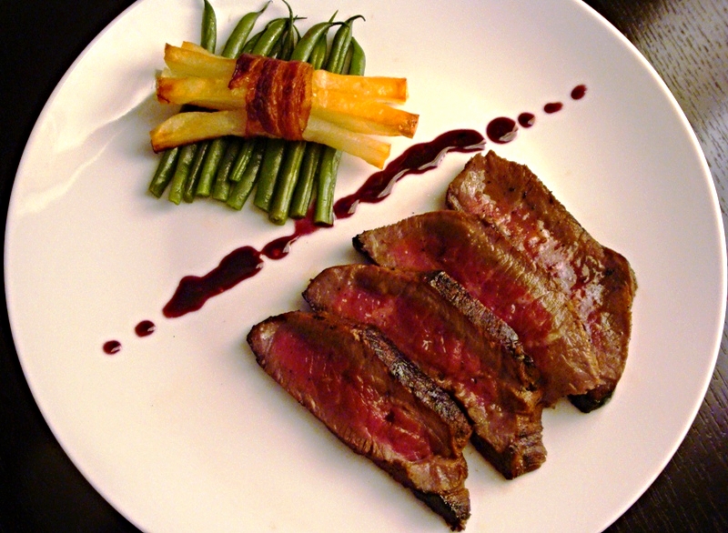 Seared beef tagliata, pancetta-wrapped potato matchsticks, haricots verts, Sangiovese gastrique