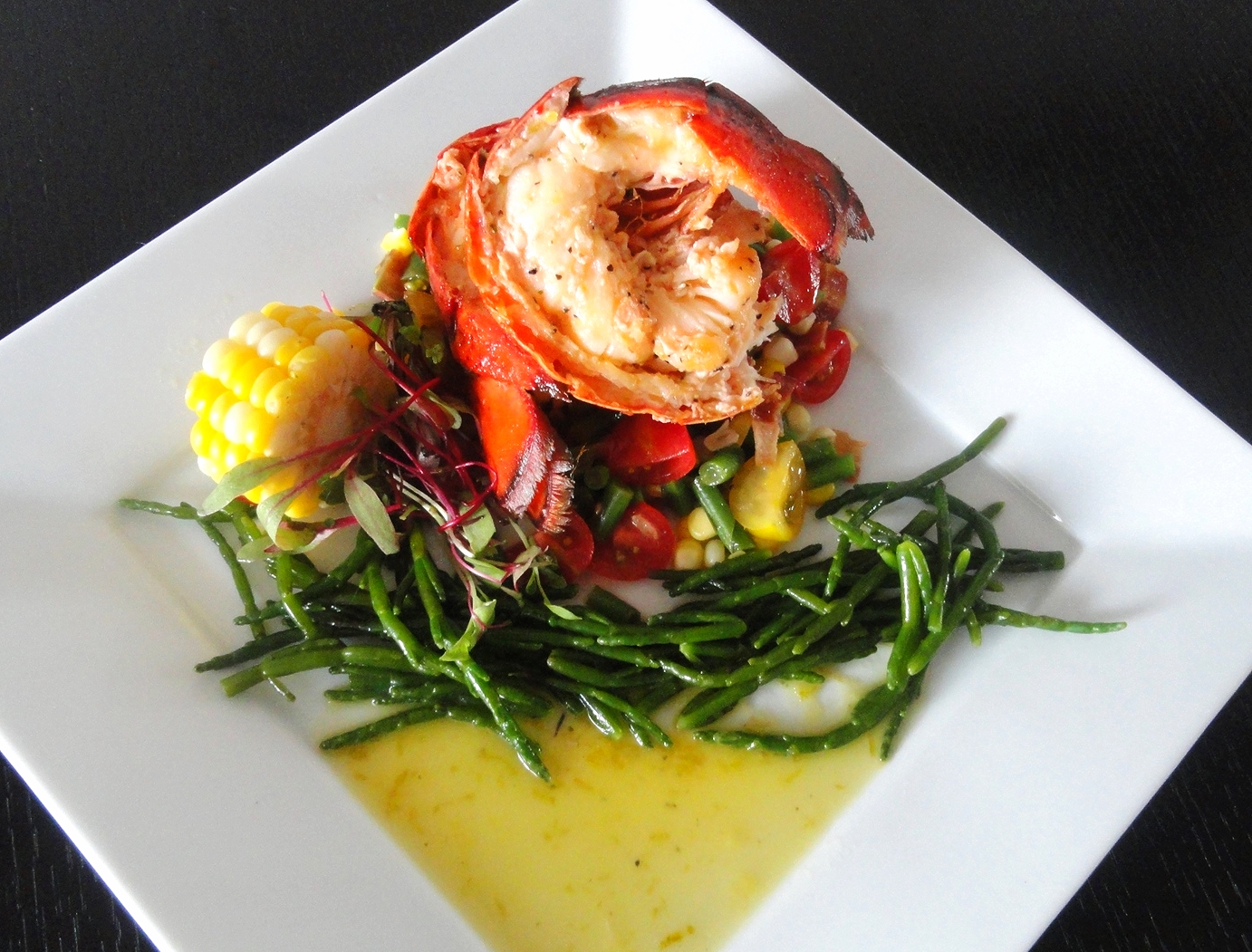 Lobster tail with summer succotash, sea beans, and a lemongrass beurre blanc