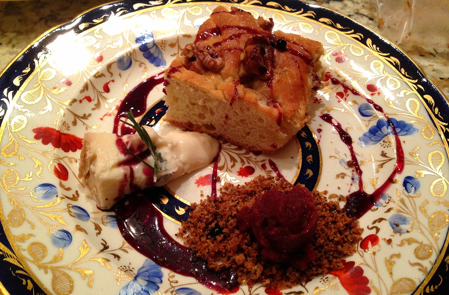 Rosemary-pecan focaccia, concord grape sorbetto on gingersnap crumble, gorgonzola dolce, spiced red wine sauce