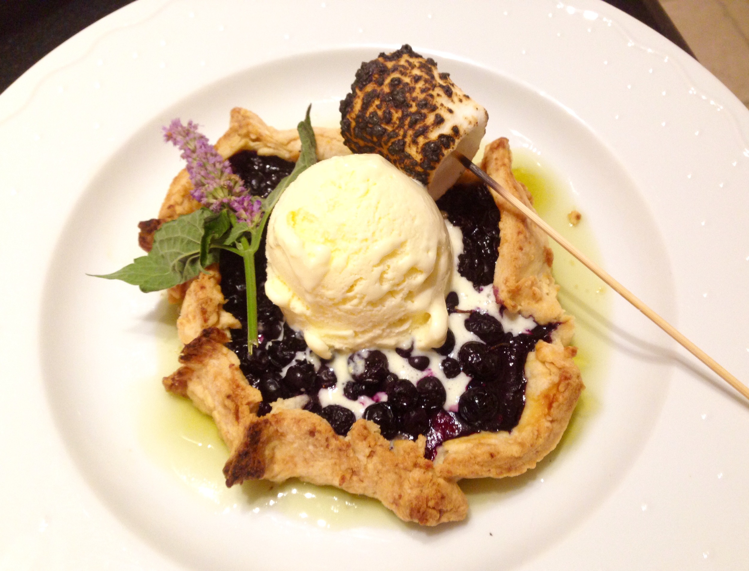 Blueberry tart with sweet corn ice cream, basil gelee, burnt marshmallow