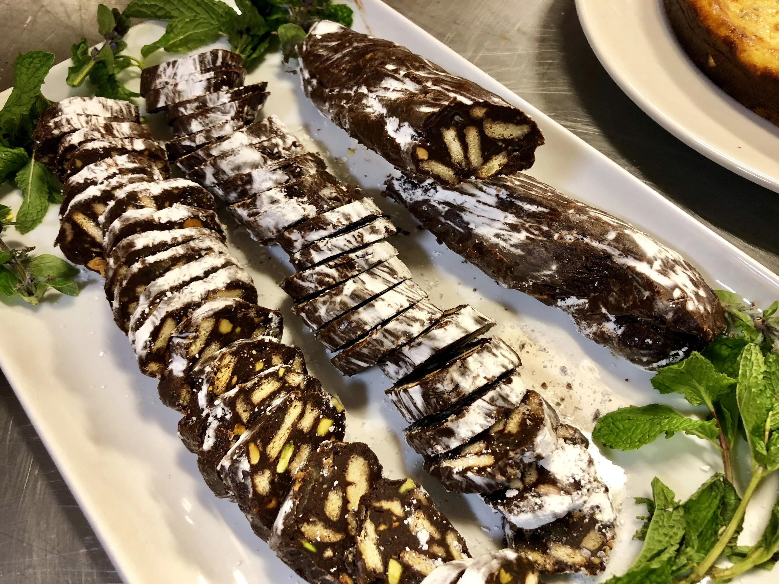 Chocolate "salami" with pistachios and candied ginger