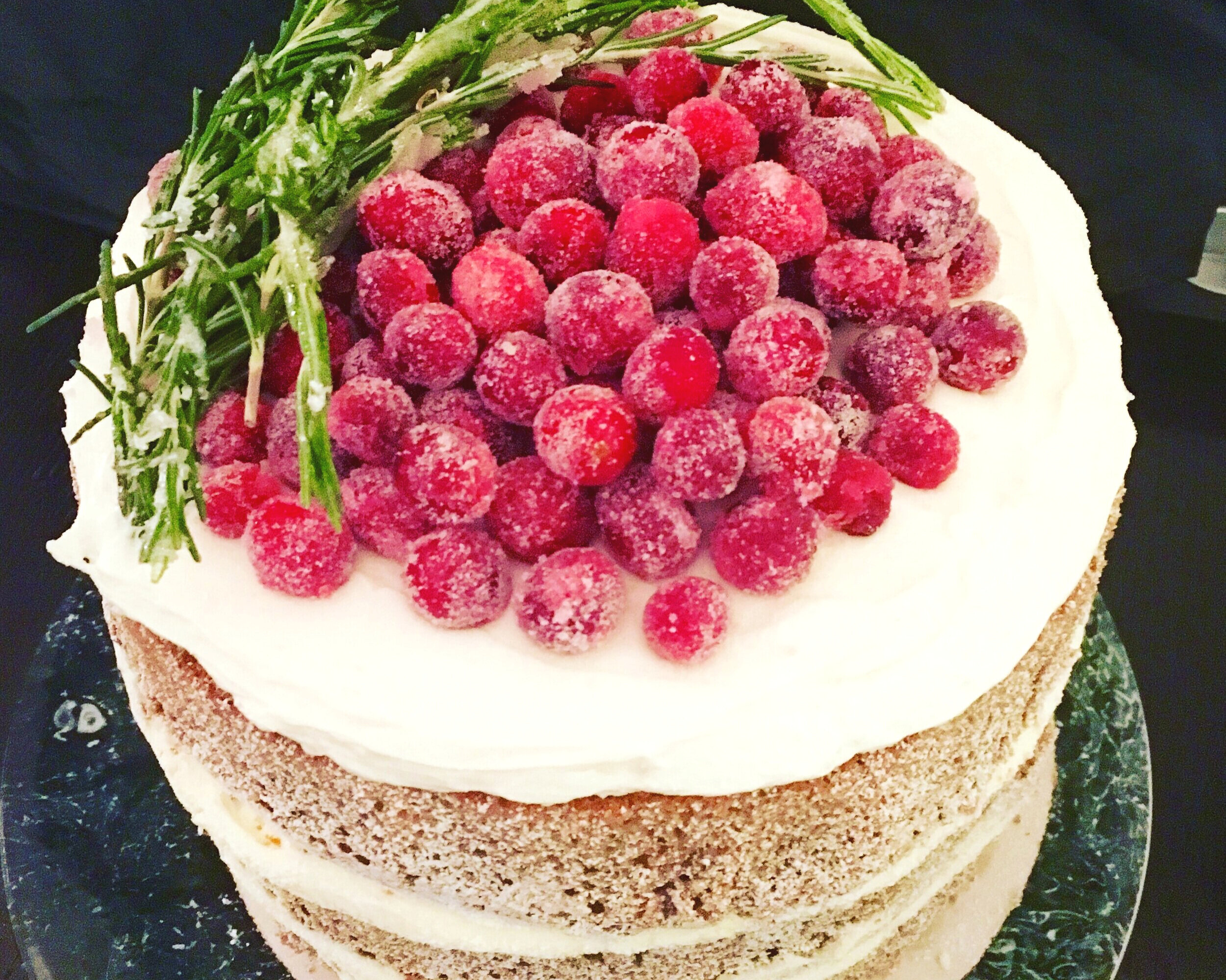Multilayered "Naked" Spice Cake with maple buttercream + candied cranberries