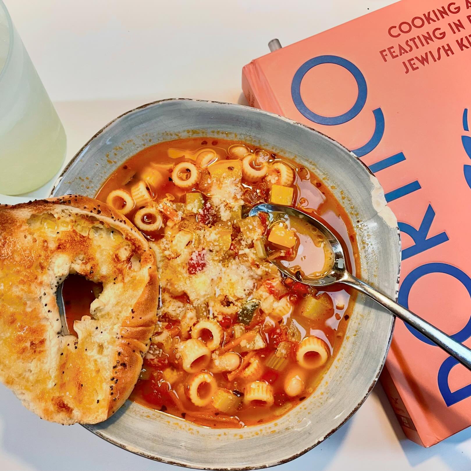 Some lounge time on a lazy rainy Sunday recently: homemade vegetable minestrone and a limonata, while perusing the @leah.koenig book about my beloved former home turf, the ghetto romano and its delicious food in #portico &mdash; great to reminisce ab