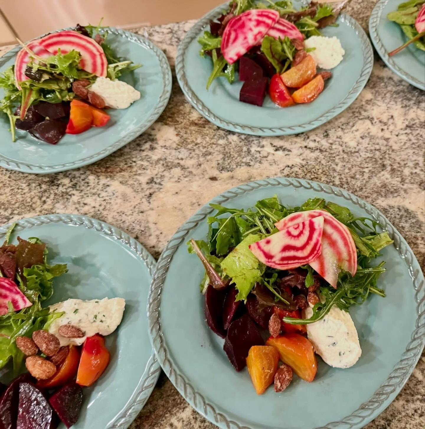 Roasted red and golden beet salad with ricotta fresca, wild greens, candied almonds, and shaved chioggia beets. #bluaubergine #fabulousfood #catering #privatechef #dinnerparty