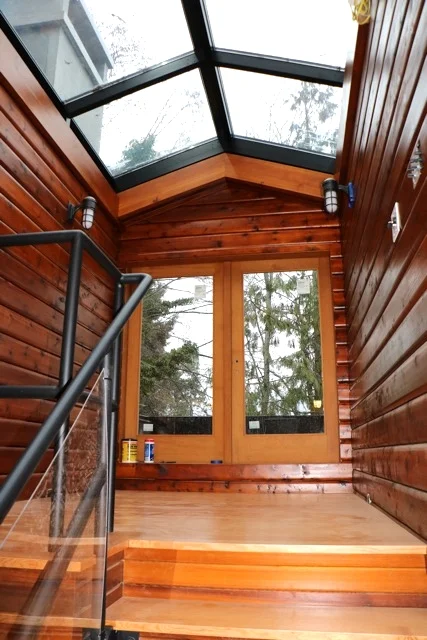 Big skylights and glass doors frame this entry way