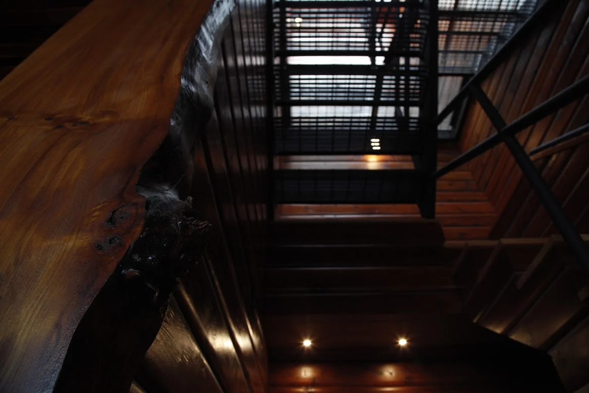 Madrona Drive Staircase successfully combining elements of the old/rustic and new