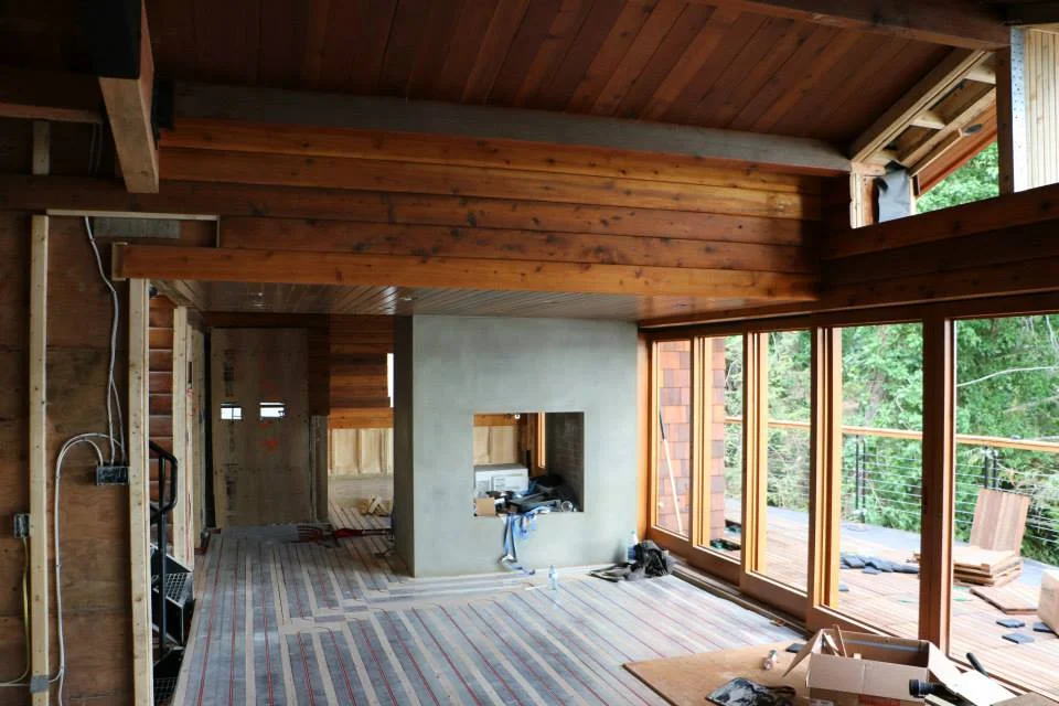 Custom polished concrete fireplace built for our Madrona Drive Project
