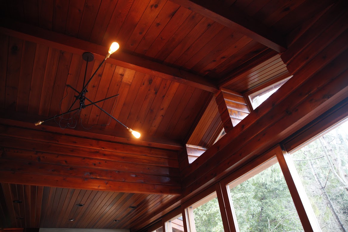 In the living area of our Madrona Home renovation, we have used a combination of ambient and overhead lighting