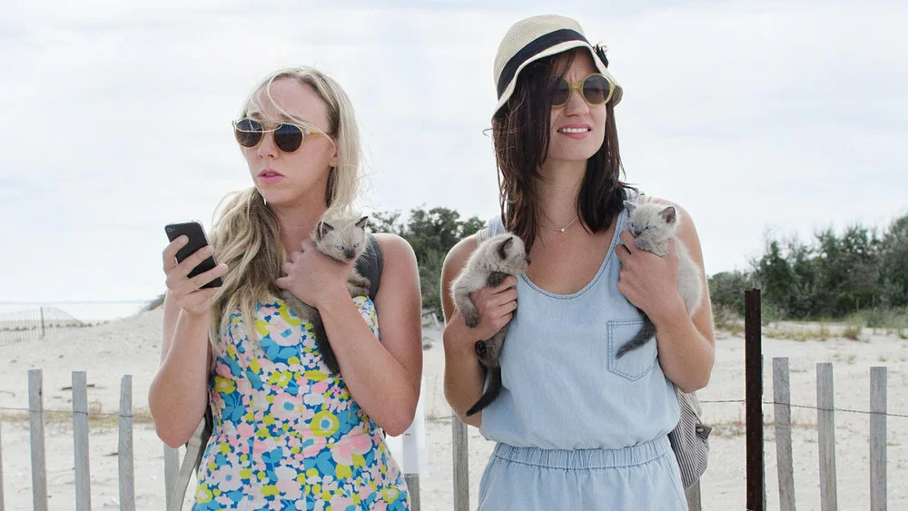 Fort Tilden Funny and frustrating, Fort Tilden will have you squirming in your seat, it will also make you question yourself and your bad habbits. These girls are charming and funny but absolutely horrible New York hipsters, spoiled rich college kids down on their luck one summer. Do not watch this if you get annoyed by hipsters easily! "New York City's secluded seaside nirvana where, like flies to honey, Brooklyn's hip millennial set flocks on sweltering weekend afternoons for unbridled summertime indulgence. Amidst the vexing stagnation of quarter-life crises, Allie (Clare McNulty) struggles to prepare for the Peace Corps, while Harper (Bridey Elliot) awaits checks from her father to fund her artistic dreams. But the two friends quickly shun responsibilities for the day when a pair of good-looking guys invites them along for a carefree Fort Tilden afternoon."