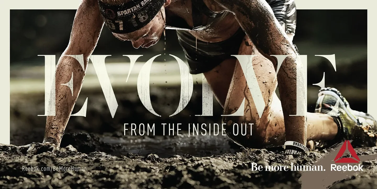 Woman crawling in the mud and headline that reads EVOLVE
