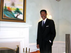 Mr. Alton Perkins , Chairman and Chief Executive Officer