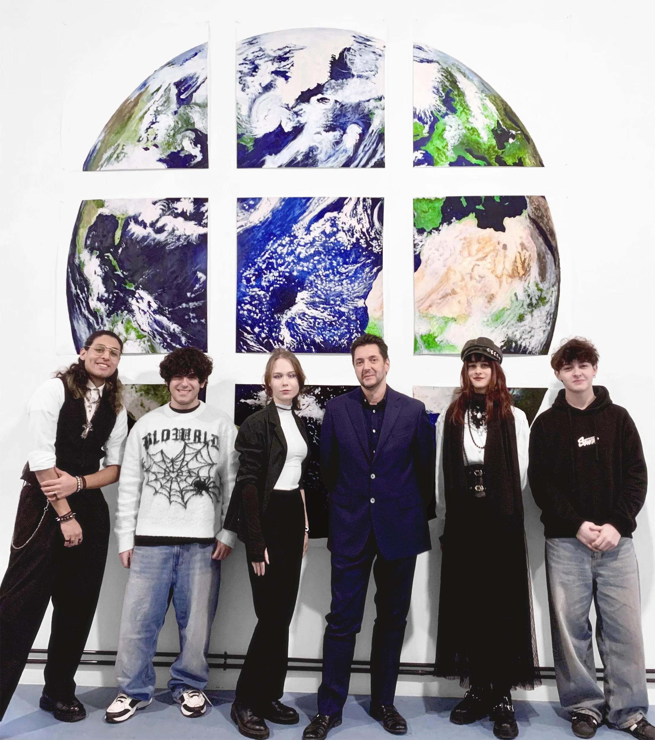 Artist Davide Ragazzi and exhibition team of WIP exhibition We Earth (Genoa, Italy, 2025)
