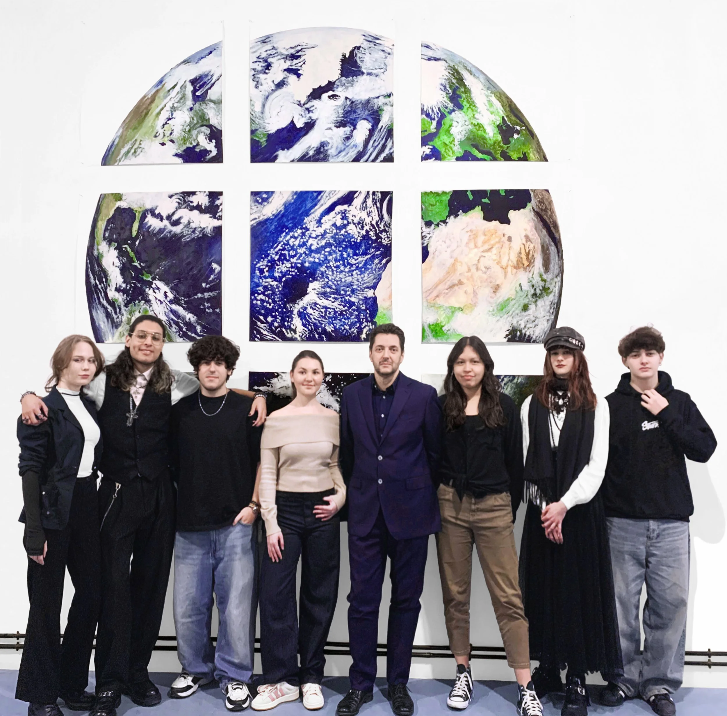 Artist Davide Ragazzi and exhibition team of WIP exhibition We Earth (Genoa, Italy, 2025)