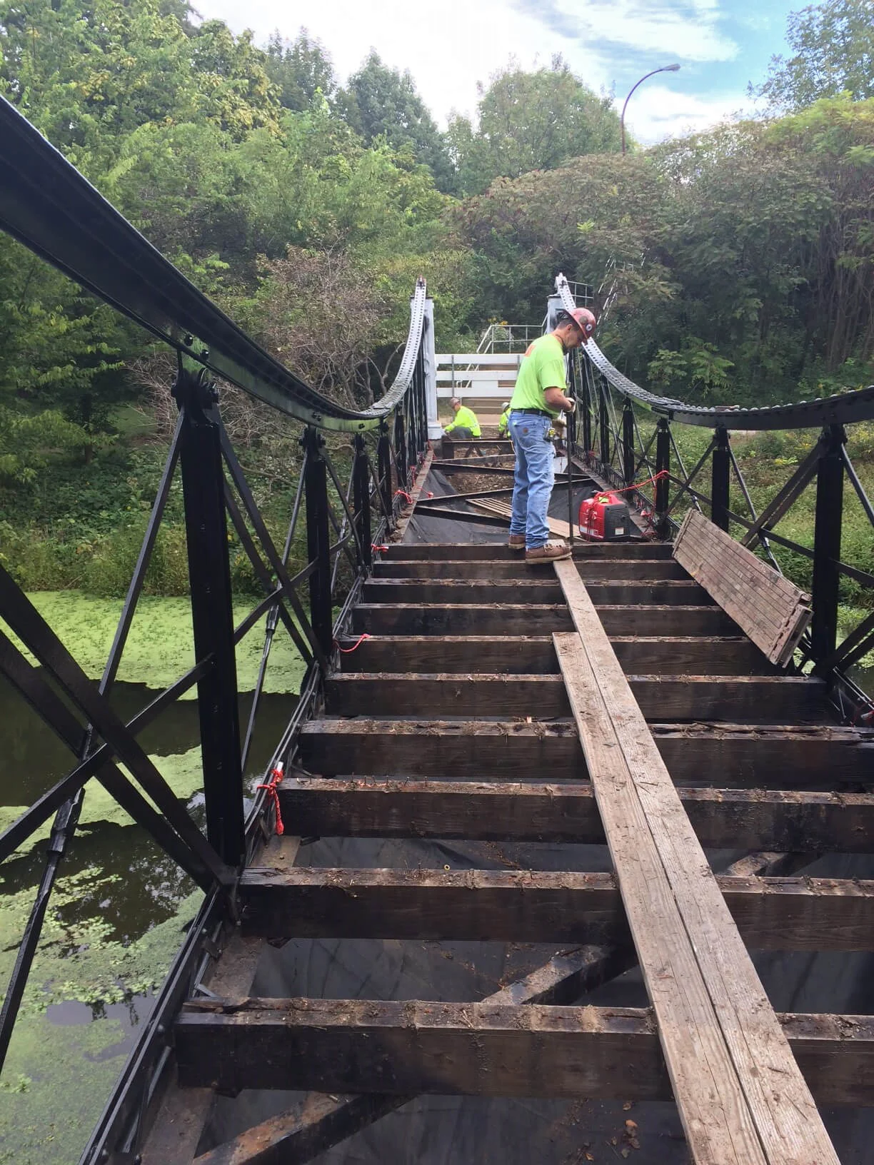 8. VICTORIAN FOOTBRIDGE Restored 1880s-era bridge , installing new deck and beams underneath.