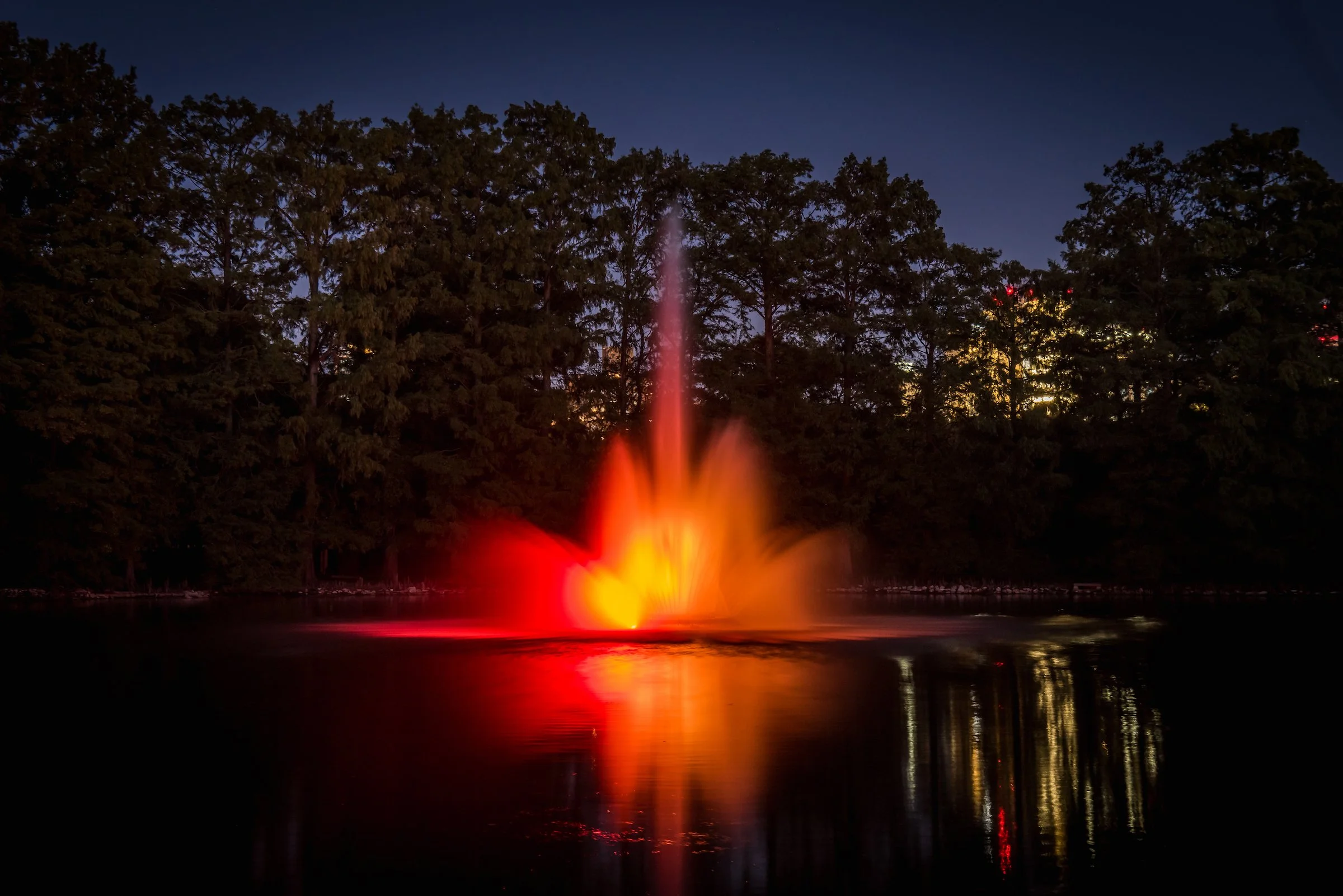 New lighting enhances the beauty of the restored fountain in Round Lake