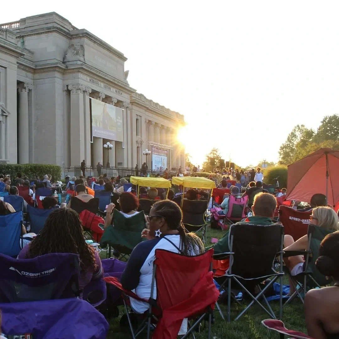 Photo of people enjoying a Twilight Tuesday concert in front of the Missouri History Museum